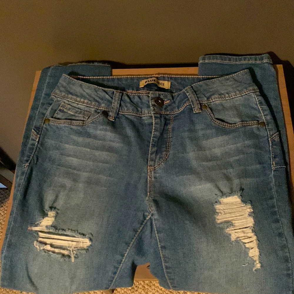 Bluespice jeans, distressed. Tight legs at bottom.